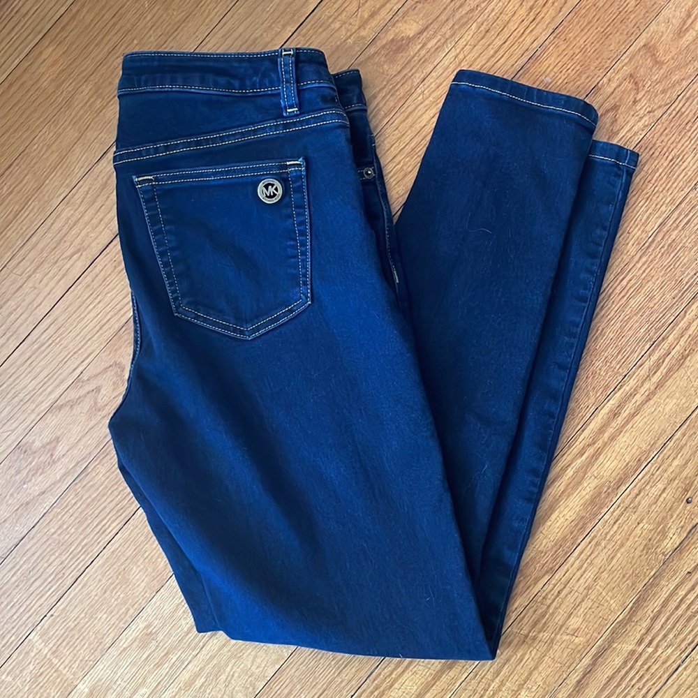 Michael Kors Women’s Izzy skinny ankle dark denim . Large MK logo